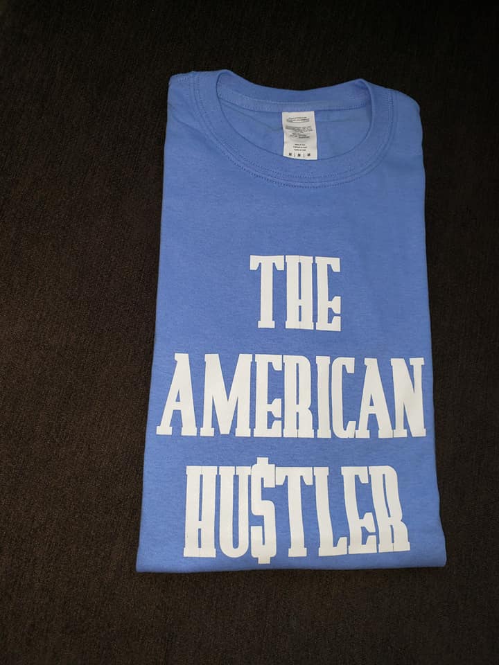 The American Hu$tler Signature Unisex Tee - Blue